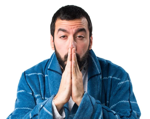 Man in dressing gown pleading — Stock Photo, Image