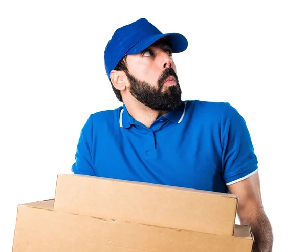 Delivery man making unimportant gesture — Stock Photo, Image