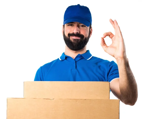 Delivery man making OK sign — Stock Photo, Image