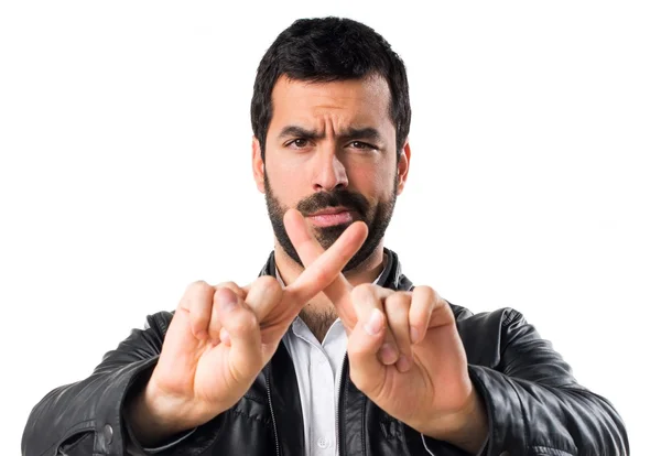 Man with leather jacket doing NO gesture — Stock Photo, Image