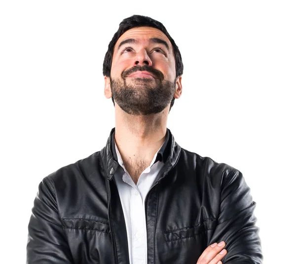 Man with leather jacket looking up — Stock Photo, Image