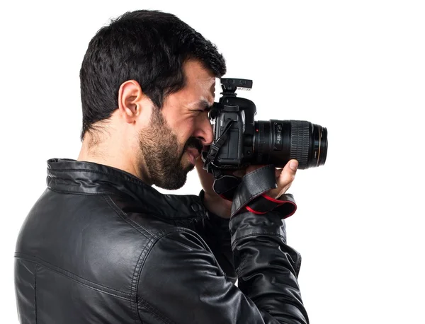 Muž s koženou bundu fotografování — Stock fotografie