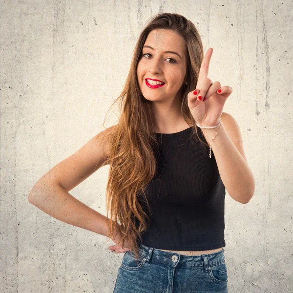 Jovem contando um — Fotografia de Stock