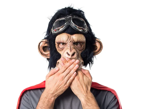 Homem macaco super-herói cobrindo sua boca — Fotografia de Stock