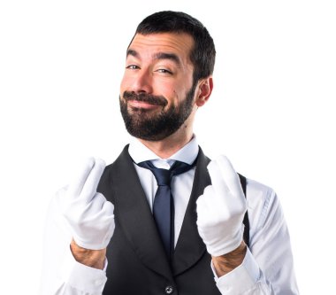 Lüks garson bir para hareketi yapıyor