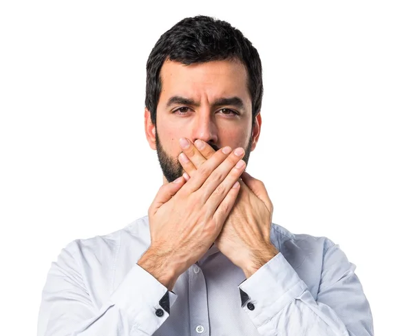 Hombre cubriéndose la boca — Foto de Stock