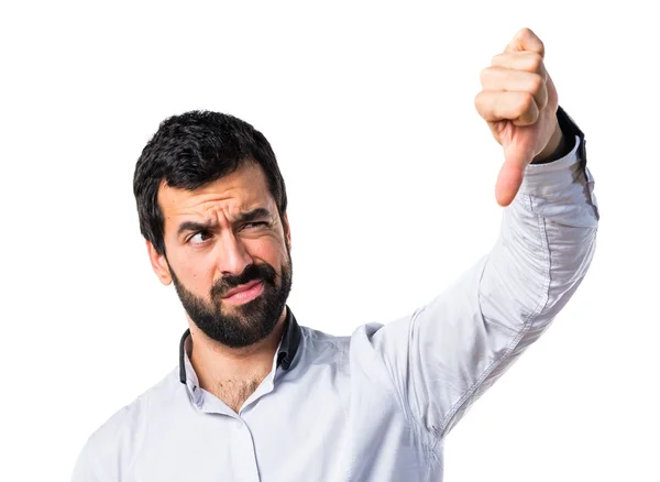 Hombre haciendo mala señal — Foto de Stock