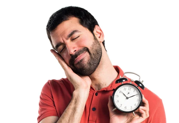 Bonito homem segurando relógio vintage — Fotografia de Stock