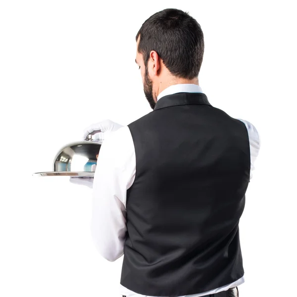 Luxury waiter holding a tray — Stock Photo, Image