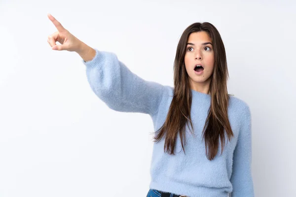 Adolescente Chica Sobre Aislado Blanco Fondo Apuntando Lejos — Foto de Stock