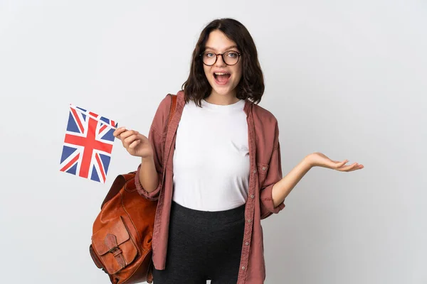 Teenager Ukrajinská Dívka Drží Britskou Vlajku Šokovaným Výrazem Obličeje — Stock fotografie