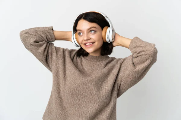 Teenager Ukrajinská Dívka Izolované Bílém Pozadí Poslech Hudby — Stock fotografie