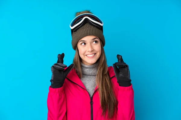 Teenager Lyžař Dívka Snowboarding Brýle Přes Izolované Modré Pozadí Prsty — Stock fotografie