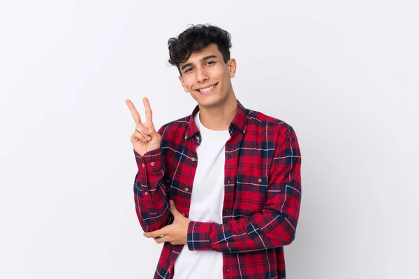 Young Argentinian Man Isolated White Background Smiling Showing Victory Sign — Stock Photo, Image