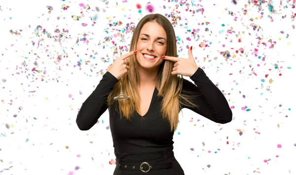 Woman Champagne Celebrating New Year Smiling Pleasant Expression While Pointing — Stock Photo, Image