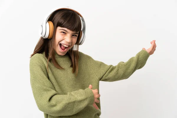 Niña Escuchando Música Con Móvil Aislado Sobre Fondo Blanco Escuchando — Foto de Stock