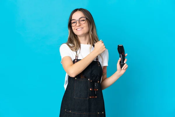 Junge Rumänische Friseurin Isoliert Auf Blauem Hintergrund Feiert Einen Sieg — Stockfoto