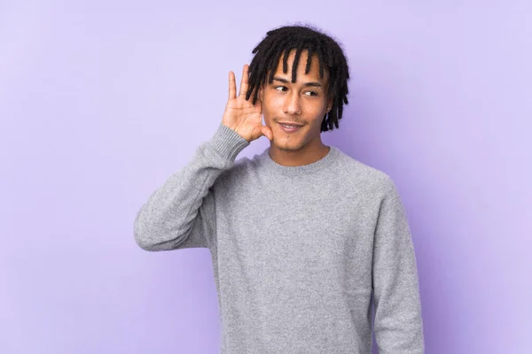 Young African American Man Isolated Purple Background Listening Something Putting — Stock Photo, Image