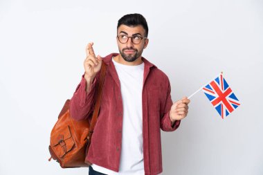 Birleşik Krallık bayrağını tutan genç İspanyol adam şans diliyor ve en iyisini diliyor.