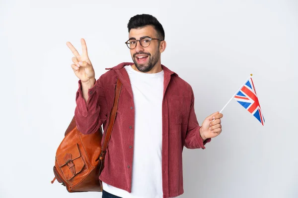 Junger Hispanischer Mann Mit Britischer Flagge Lächelt Und Zeigt Siegeszeichen — Stockfoto