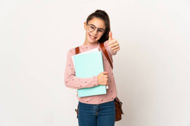 Tecrit edilmiş küçük bir kız öğrenci. Başparmakları havada. Çünkü iyi bir şey oldu.