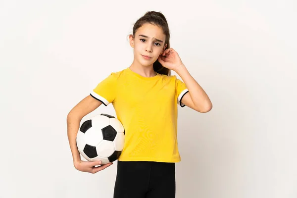 Beyaz Arka Planda Izole Edilmiş Küçük Futbolcu Kızın Şüpheleri Var — Stok fotoğraf