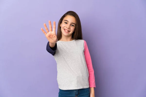 Klein Meisje Geïsoleerd Paarse Achtergrond Gelukkig Tellen Vier Met Vingers — Stockfoto