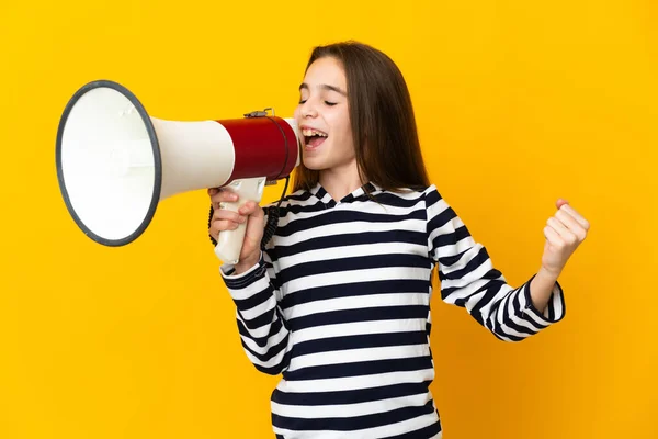 Little Girl Isolated Yellow Background Shouting Megaphone Announce Something Lateral — Stock Photo, Image