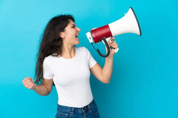 Teenager Russian Girl Isolated Blue Background Shouting Megaphone Announce Something — Stock Photo, Image