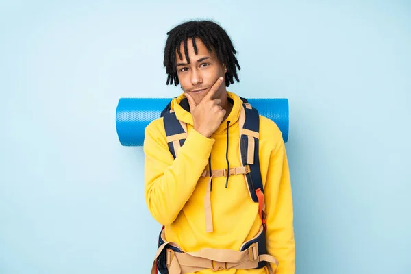 Young Mountaineer African American Man Big Backpack Isolated Blue Background — Stock Photo, Image