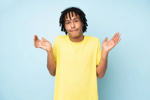 Young African American Man Isolated Blue Background Having Doubts While — Stock Photo, Image