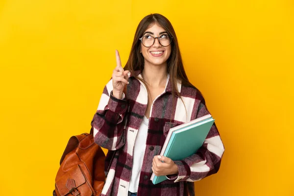Young Student Woman Isolated Yellow Background Pointing Great Idea — Stock Photo, Image