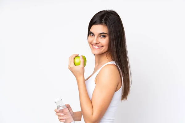 Junge Frau Vor Isoliertem Weißen Hintergrund Mit Einem Apfel Und — Stockfoto