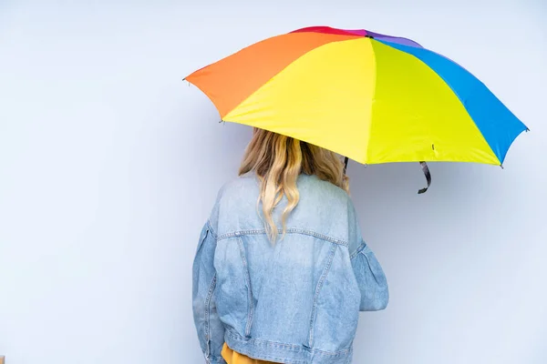 Teenager Russian Girl Holding Umbrella Isolated Blue Background Back Position — Stock Photo, Image