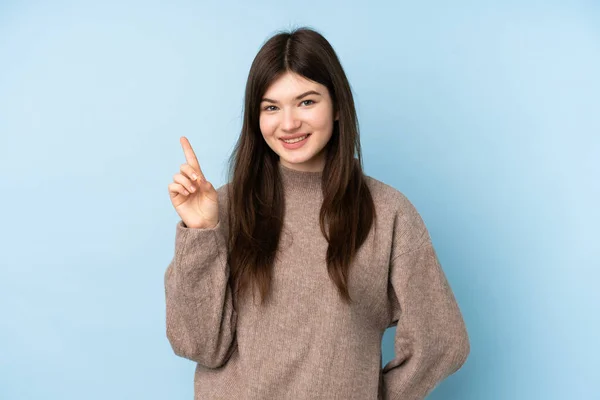 Mladý Ukrajinský Teenager Dívka Nosí Svetr Přes Izolované Modré Pozadí — Stock fotografie