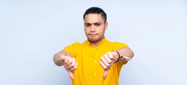 Asian Handsome Man Isolated Background Showing Thumb Two Hands — Stock Photo, Image