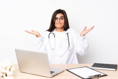 Professional traumatologist in workplace having doubts with confuse face expression clipart