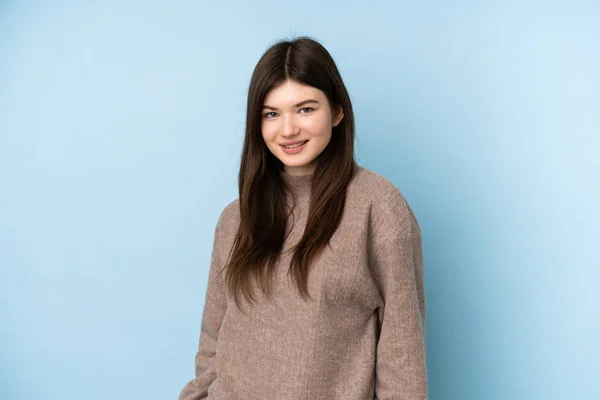 Jovem Adolescente Ucraniana Vestindo Uma Camisola Sobre Fundo Azul Isolado — Fotografia de Stock