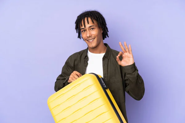 Young African American Man Isolated Purple Background Vacation Travel Suitcase — Stock Photo, Image