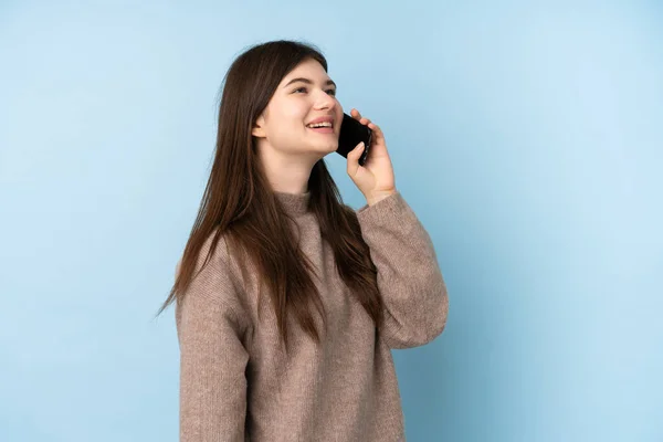 Joven Adolescente Ucraniana Usando Suéter Sobre Fondo Azul Aislado Manteniendo — Foto de Stock