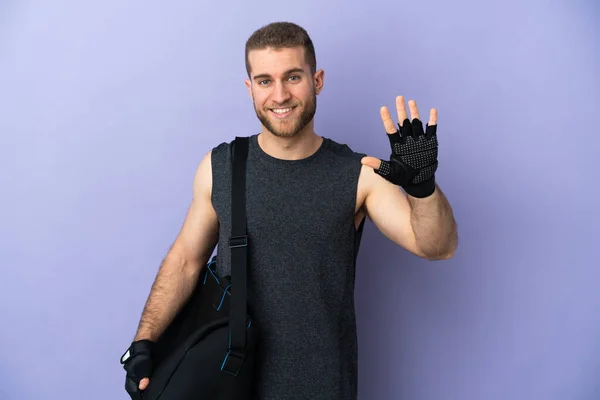 Joven Deportista Con Bolsa Deporte Aislada Sobre Fondo Blanco Contando —  Fotos de Stock