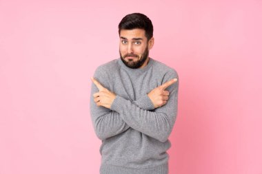 Kafkasyalı yakışıklı adam soyutlanmış arka planda şüpheleri var.