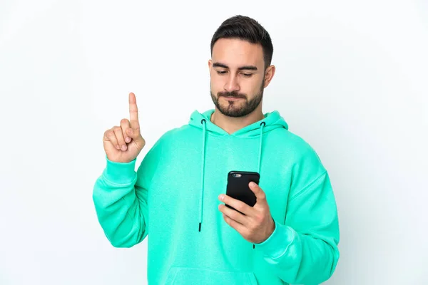 Junge Kaukasische Schöner Mann Isoliert Auf Weißem Hintergrund Mit Handy — Stockfoto