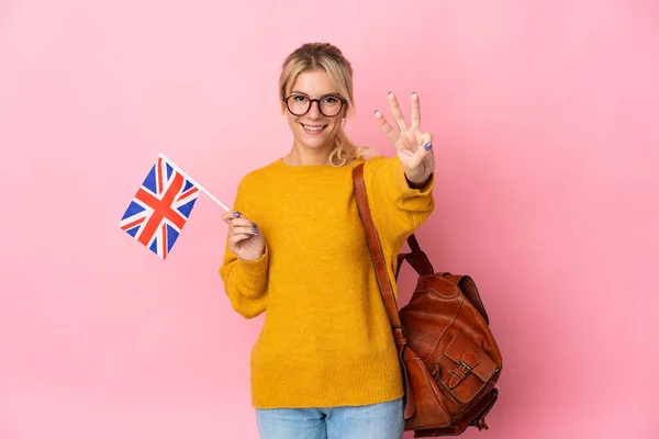 Молодая Россиянка Флагом Великобритании Розовом Фоне Счастлива Считает Троих Пальцами — стоковое фото