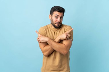 Tecrit edilmiş geçmişi olan sakallı yakışıklı bir genç. Yan tarafların şüpheleri olduğunu gösteriyor.