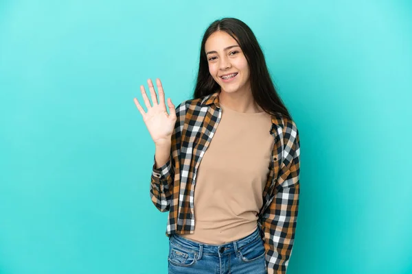 Jong Frans Vrouw Geïsoleerd Blauw Achtergrond Salueren Met Hand Met — Stockfoto