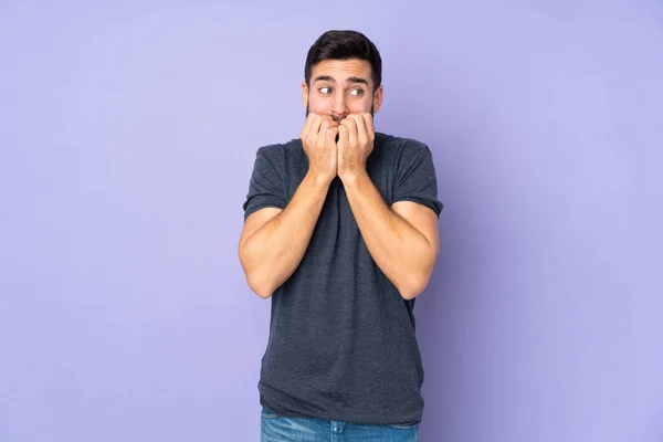 Caucasian Handsome Man Nervous Scared Putting Hands Mouth Isolated Purple — Stock Photo, Image