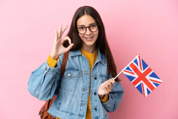 국기를 프랑스 소녀가 분홍색 배경에 고립되어 손가락으로 사인을 — 스톡 사진