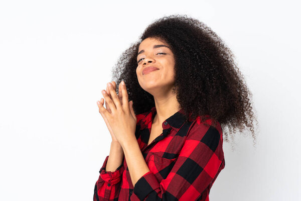 Young african american woman over isolated background scheming something