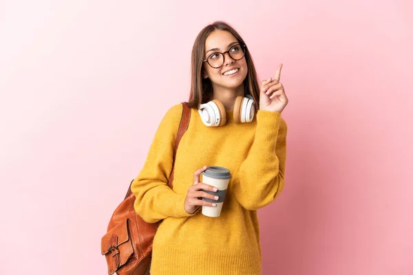 Jonge Student Vrouw Geïsoleerde Roze Achtergrond Wijzend Een Geweldig Idee — Stockfoto